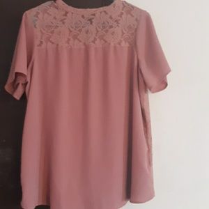 Blush colored shirt in size large womans